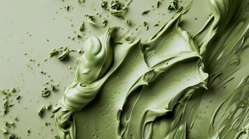 Textured Green Paint Swirls on Surface photo