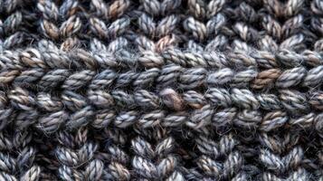 Texture of Gray Hand-Knit Woolen Fabric photo