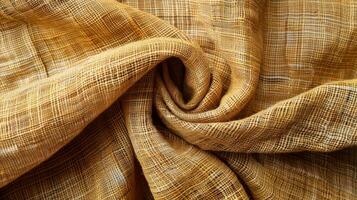 Close-up Texture of a Yellow Checkered Fabric Fold photo