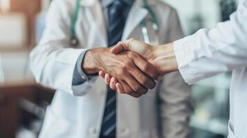 Doctors Shaking Hands in Medical Office photo