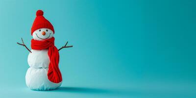 A snowman in a red hat and scarf photo