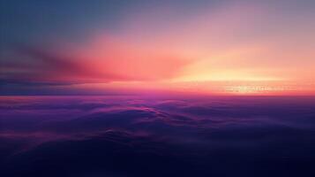 Dreamy Sunset Over Purple and Pink Cloudscape with Vibrant Horizon and Soft Waves photo
