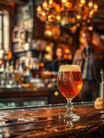 Glass of beer on the bar counter, man on the background photo