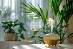 A small humidifier on a table next to a plant photo