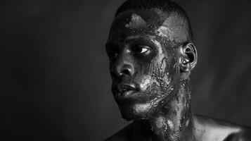 Dramatic Portrait of a Man with Artistic Facial Paint in Monochrome photo