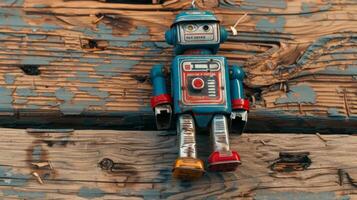 Vintage Robot Toy Lying on Wooden Background. Rustic Retro Nostalgic Childhood photo