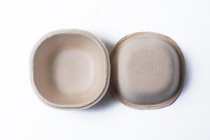 Top view of eco friendly biodegradable food container paper box on white background. photo