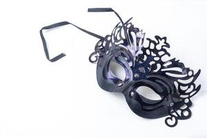 Mardi Gras mask isolated on white background with clipping path. photo