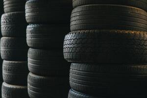 old used car tire stacked rubber waste need for recycle environment impact garbage photo
