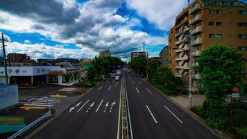 A timelapse of car street at Kanpachi avenue in Tokyo daytime wide shot zoom video