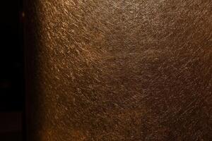 Abstract black and gold lines background with low light effect. photo