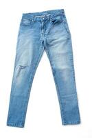 Fashionable denim blue jeans isolated on white background top view photo