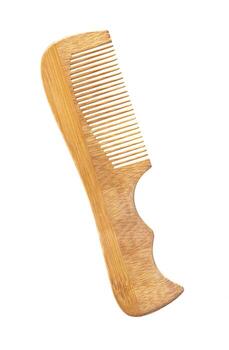 un de madera peine en blanco antecedentes foto