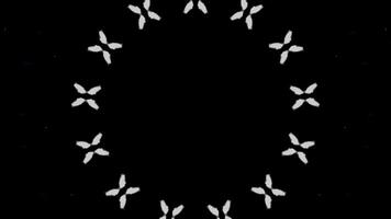 loop animation of circular pattern of white and blue light on black background video