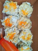 Dimsum is a large range of small dishes that Cantonese people traditionally enjoy in restaurants for breakfast and lunch. photo