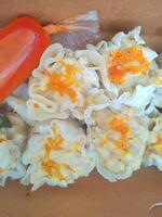 Dimsum is a large range of small dishes that Cantonese people traditionally enjoy in restaurants for breakfast and lunch. photo