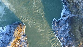 Aerial view of the scenery in Iceland with a waterfall video