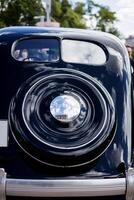 Minsk, Belarus, May 16, 2024 - Rear view black retro car Chrysler Airflow photo