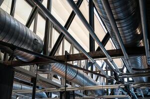 Ceiling structure with steel ventilation pipe and pipe systems photo