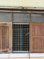 window with a wooden frame photo