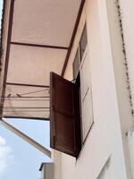 old window with a white wall photo
