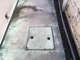 the hole in concrete floor photo