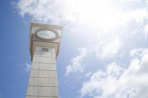 clock tower on the blue sky background photo