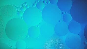 Abstract blue and green colorful background with oil on water surface. Oil drops in water abstract psychedelic, abstract image. photo