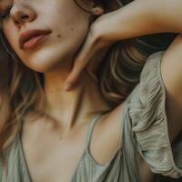 Contemplative mood young woman closeup photo