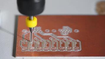 machine with numerical control CNC carries out milling of printed circuit boards, Circuit Engraving, Diy Circuit Boards PCB photo