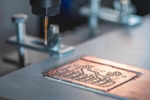machine with numerical control CNC carries out milling of printed circuit boards, Circuit Engraving, Diy Circuit Boards PCB photo