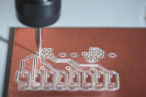 machine with numerical control CNC carries out milling of printed circuit boards, Circuit Engraving, Diy Circuit Boards PCB photo