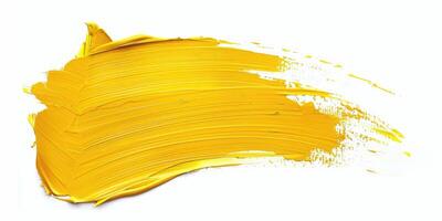 yellow stroke of paint texture isolated on white background photo