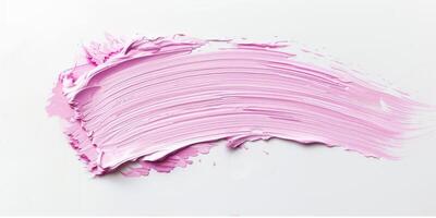 light pink stroke of paint texture isolated on white background photo