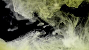Ink blend. Paint water mix. yellow color gradient acrylic fluid wave flow motion creative art abstract background. abstract background, texture, 4K photo
