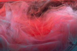 clouds of red and blue smoke on black background, clouds of paint in water, aquarium, abstract background, texture photo