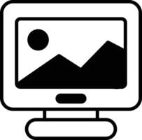 A computer monitor with a picture of mountains on it vector