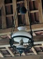 old java hanging ceiling lamp. ancient house decoration. photo