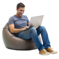 Young man relaxing on bean bag while using a laptop png