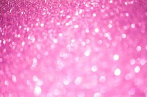 Glitter paper background. Festive sparkle texture. Decorative element for party, birthday, New Year design photo