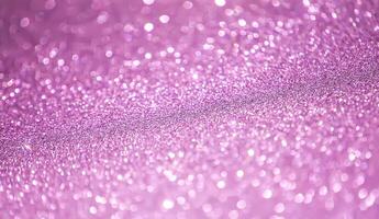 Glitter paper background. Festive sparkle texture. Decorative element for party, birthday, New Year design photo