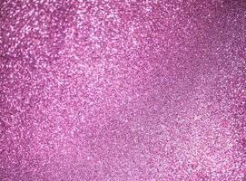 Glitter paper background. Festive sparkle texture. Decorative element for party, birthday, New Year design photo