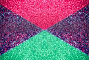 Glitter paper background. Festive sparkle texture. Decorative element for party, birthday, New Year design photo