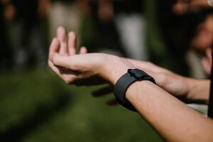 Hands poised to clap, capturing the energy and unity of a team-building event in action photo