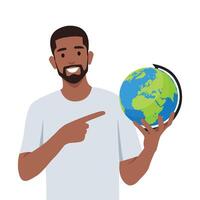 The successful businessman holds in a hand globe on. vector