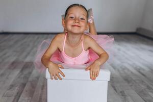 Baby ballet studio. Little ballerina with a coach in dance class. Ballet trainer for children photo