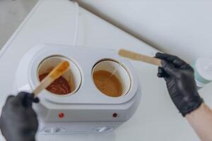 Sugar paste for shugaring depilation. Beauty spa minimalist concept. photo