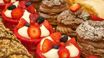 An array of baked goods, including pastries, is showcased in the bakery video