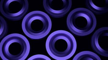 3D rings with hypnotic effect. Design. 3D nuts pulsing and hypnotizing on black background. Nuts or rings with metallic sheen rotate hypnotically video