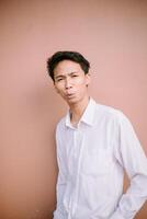A man whistling, captured in a moment of joy or concentration, expressing himself through a melodic sound photo